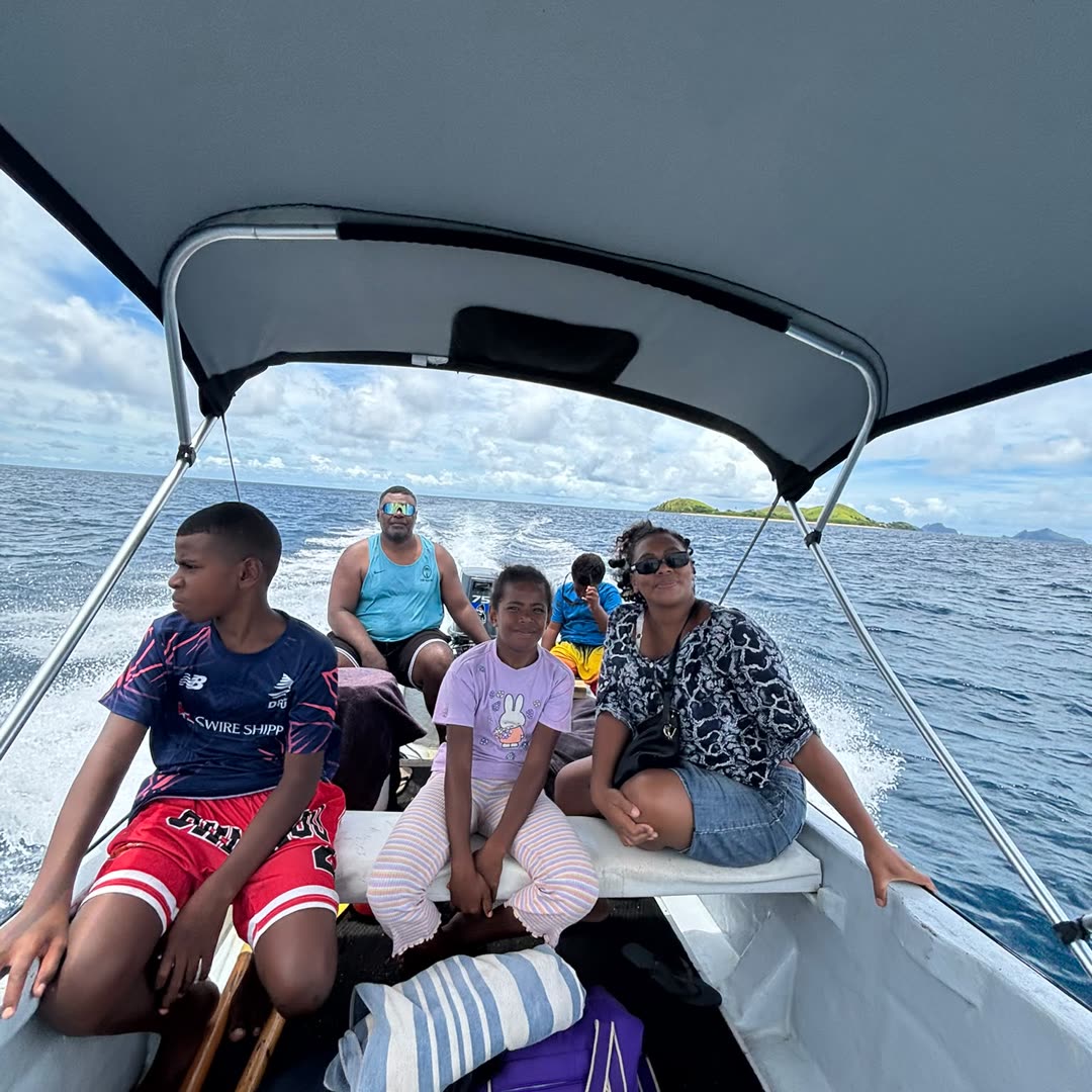 Joe and his family on Mana Island